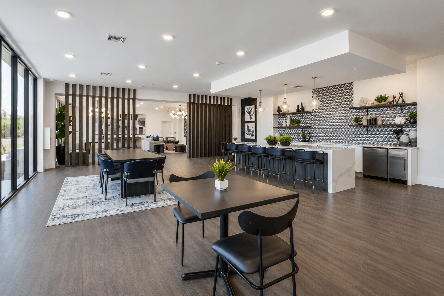 A modern dining room with a table set for six.